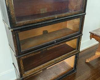 The Globe Wernicke Co. Sectional Bookcase. Made in Cincinnati.    Bottom glass is missing.