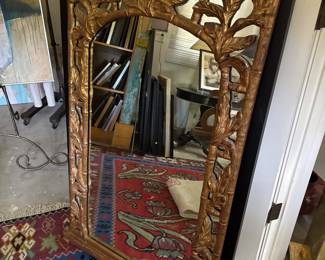 Nice carved mirror.