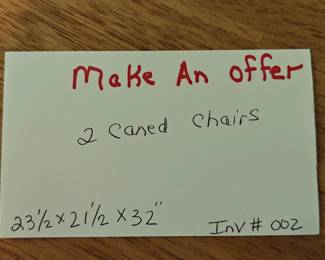 002	Pair of Caned Chairs	23.5x21.5x32