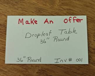 001	Dropleaf Table	36" Round