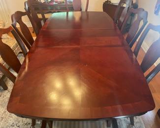 Large Dining Room Table W/ 2 Leaves, 8 Chairs, & Table Pads
