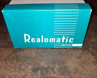 Realomatic W/ Box