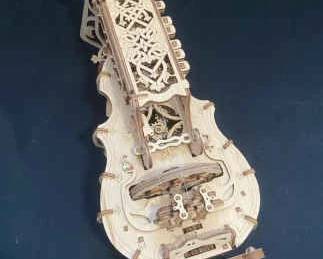 Intricate Wooden Mechanical HurdyGurdy Puzzle