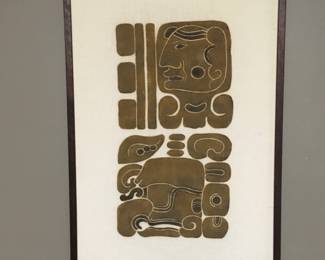 Cloth artwork taken from Mayan cemetery marker in Guatemala. Framed in wood.