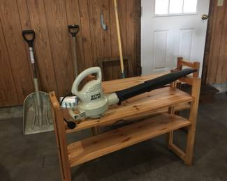 Stihl leafblower and storage shelves.