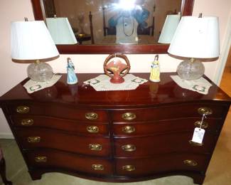 Serpentine Mahogany dresser, Roseville Basket, Crystal Lamps