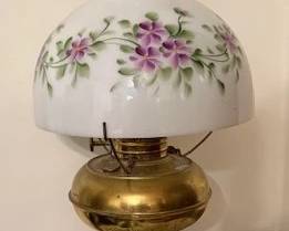 This is also a vintage electric "Gone With the Wind" style lamp. It is a kerosene lamp that has been "electrified." The style is Victorian.