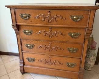 This is an antique Eastlake style dresser from the late 1800s.