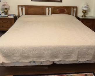 This bed is part of a five-piece matching bedroom set, which is solid wood. The other pieces follow.