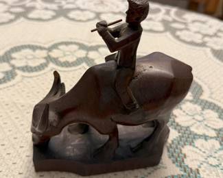 This is a nice wood carving of a boy on an ox, again from Asia.