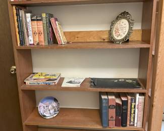 This is a mid-century modern bookcase, with more than adequate shelving for large books.