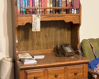 This is a handy kitchen hutch, with both shelving and a lower cabinet for storate.