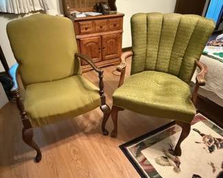 These are two armchairs. They have seen a lot of use, and could use refreshing. But they are handy to have.