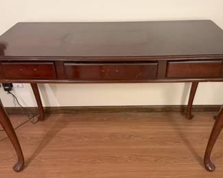 This is a pretty table which is in need of hardware and some TLC for scratches. But it's still a nice piece for any house.