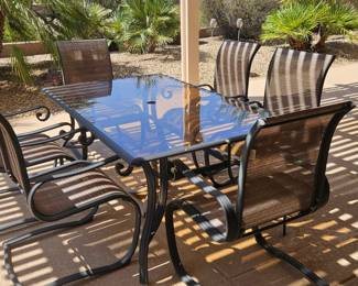 Patio table and 6 chairs - $275.00
Dimensions:
42 inches deep 
72 inches long 
28 inches tall