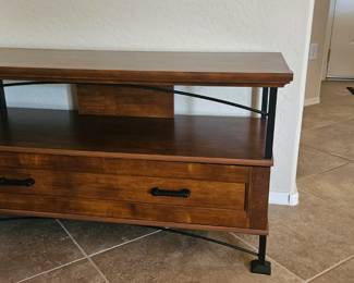 Small wood and iron tv stand - $100.00
Dimensions: 
17 1/2 inches deep
43 1/4 inches wide
23 1/2 inches tall 
