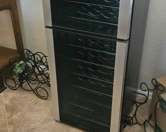Wine fridge ( holds 50 bottles ) $145.00
Dimensions:
18 inches deep 
18 1/2 inches wide
46 1/4 inches tall 