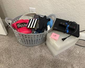 Lot48   DVD player, plastic containers and miscellaneous basket of items $10