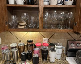 Lot 2 group of cups 3 to 4 yetis a couple Cody’s wine, glasses, coffee, cups. $55