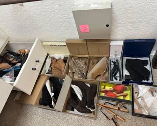 Lot 52   Lot of shoes, some new, some used and a drawer of shoe stretchers. $60