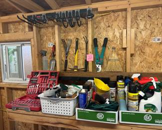Lot 22   Yard tools, products, and toolbox. $30