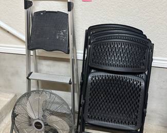 Lot 39  four folding chairs, one fan and stepstool. $38