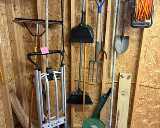 Lot 21 dolly, yard tools $75 