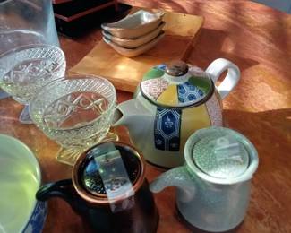 Assortment of Tea pots and dish ware 