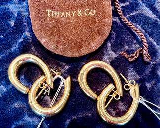 Tiffany & Co 14k gold hoops.
