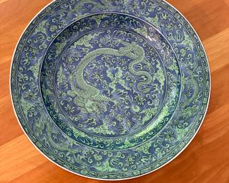 Large dragon plate on blue ground.  Kozan Kiln mark.