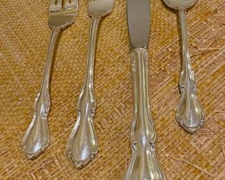Reed and Barton Hampton Court sterling flatware. Twelve 4-piece place settings