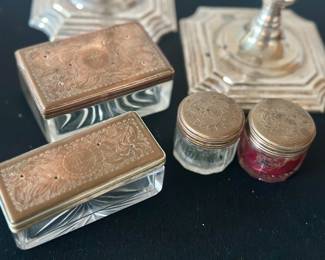 Collection glass lidded jars and glass boxes with sterling lids engraved with the seal of the Clan Hamilton.