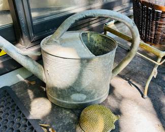 Watering can and hedgehog doorstop