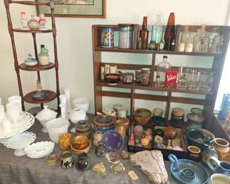 Pottery, rocks, fossils and milk glass.  And some old bottles