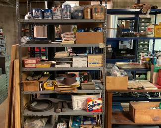 Metal shelf with lots of tools