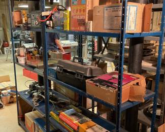 Metal shelves with toos