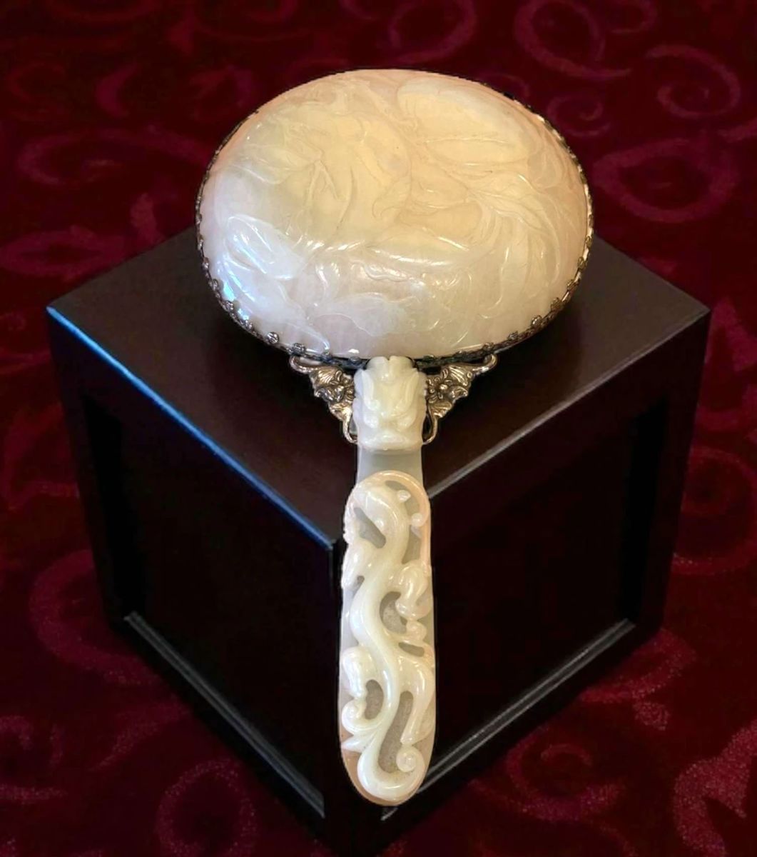 A WHITE JADE MOUNTED SILVER HAND MIRROR