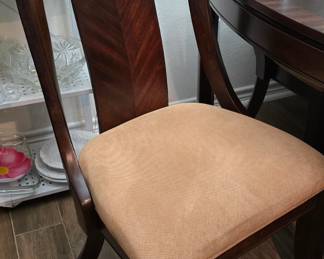One of the Chairs that goes to Dining table