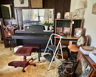 Electric piano, clocks, desk