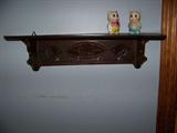 Black walnut carved shelf with carving from Germany.