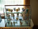 Collection of miniture pottery animals, vases, etc. Shawnee, Redwing, Harlequin, etc.