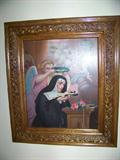 Very detailed victorian frame with print of the saint of impossible things.