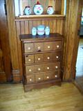 Cute four drawer pine cabinet.