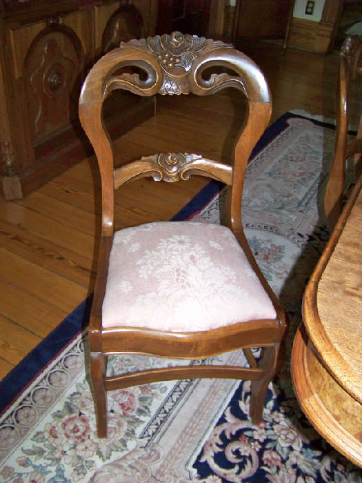 Elegant walnut dining chair.