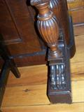 Close up of claw feet on piano.