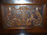 Carving on piano.