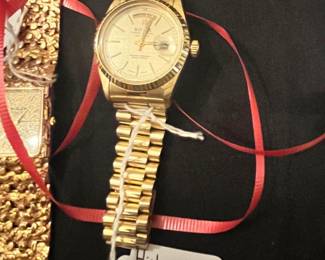 ONE OF TWO HIGH-END "FAKE" ROLEX WATCHES