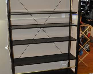 Modern illuminated shelving unit designed by Edward Wormley for Dunbar. Dimensions: 48" wide x 76 1/2" tall by 16 3/4" deep. Model 5455
