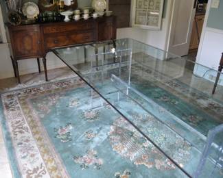 4' x 9' beveled glass dining table with reticulated lucite pedestal similar to designs by Charles Hollis Jones - Pace - Knoll - Lion in Frost. A fine 1970's Chinese rug 9' x 12' 6" with 7/8" pile
