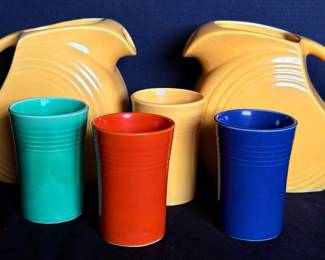 Two Fiesta Ware Pitchers And Four Cups
